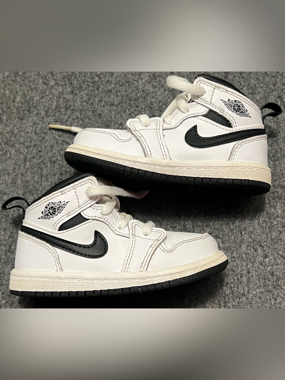 Nike Air Jordan Kids' White and Black High-Top Sneakers